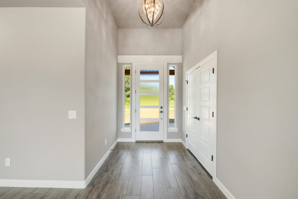 Luxury living room featuring a beautiful open floor plan by Mahogany Homes.