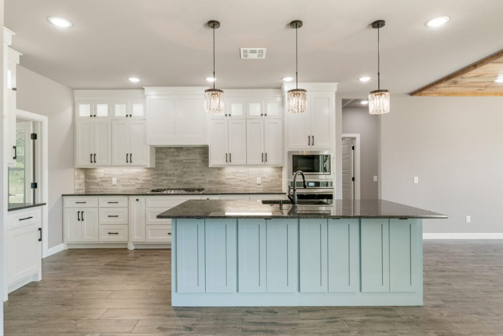 High-end kitchen with unique design elements and premium materials by Mahogany Homes.