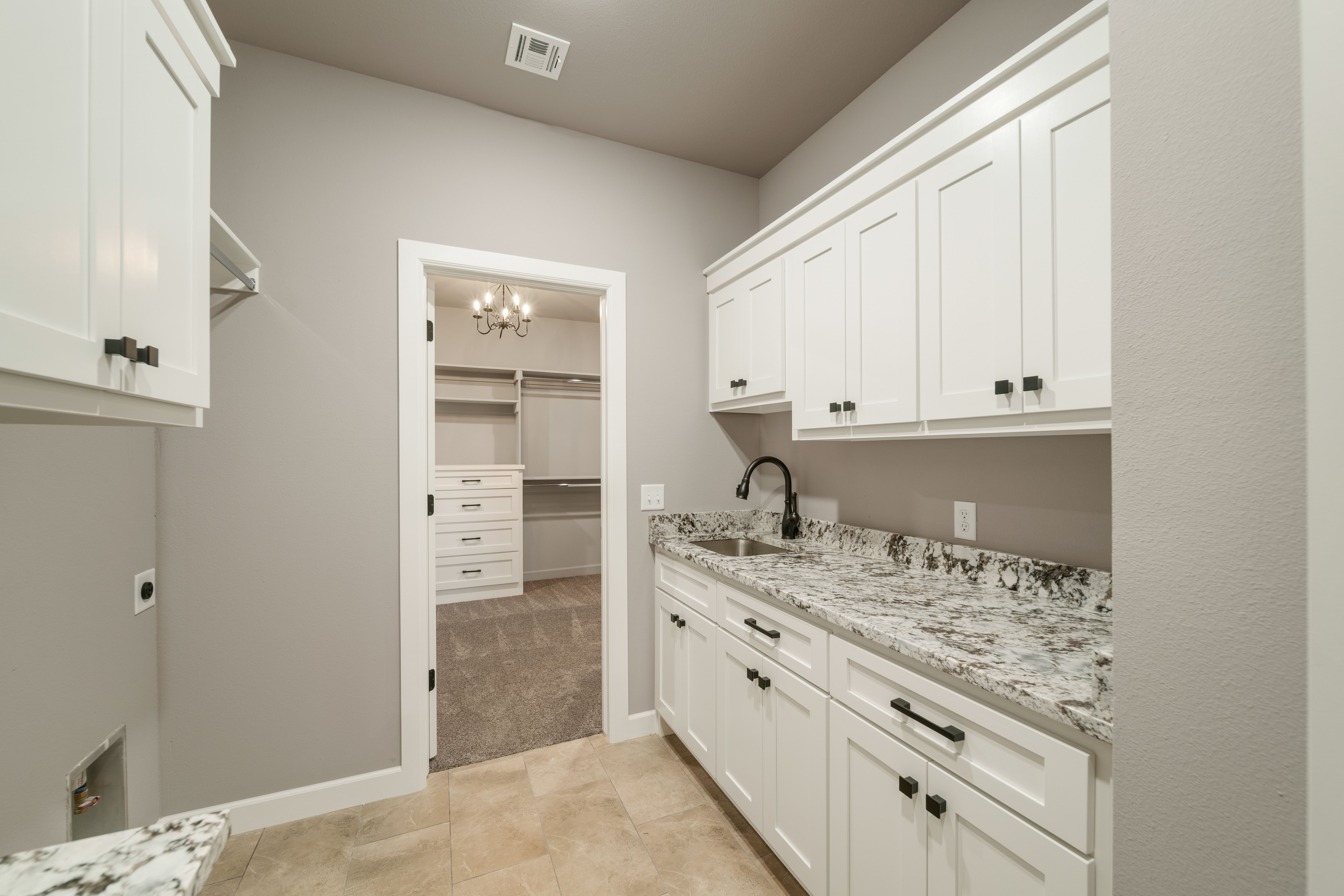 Luxury floor plan with oversized rooms, elegant finishes, and a spacious layout by Mahogany Homes Tulsa