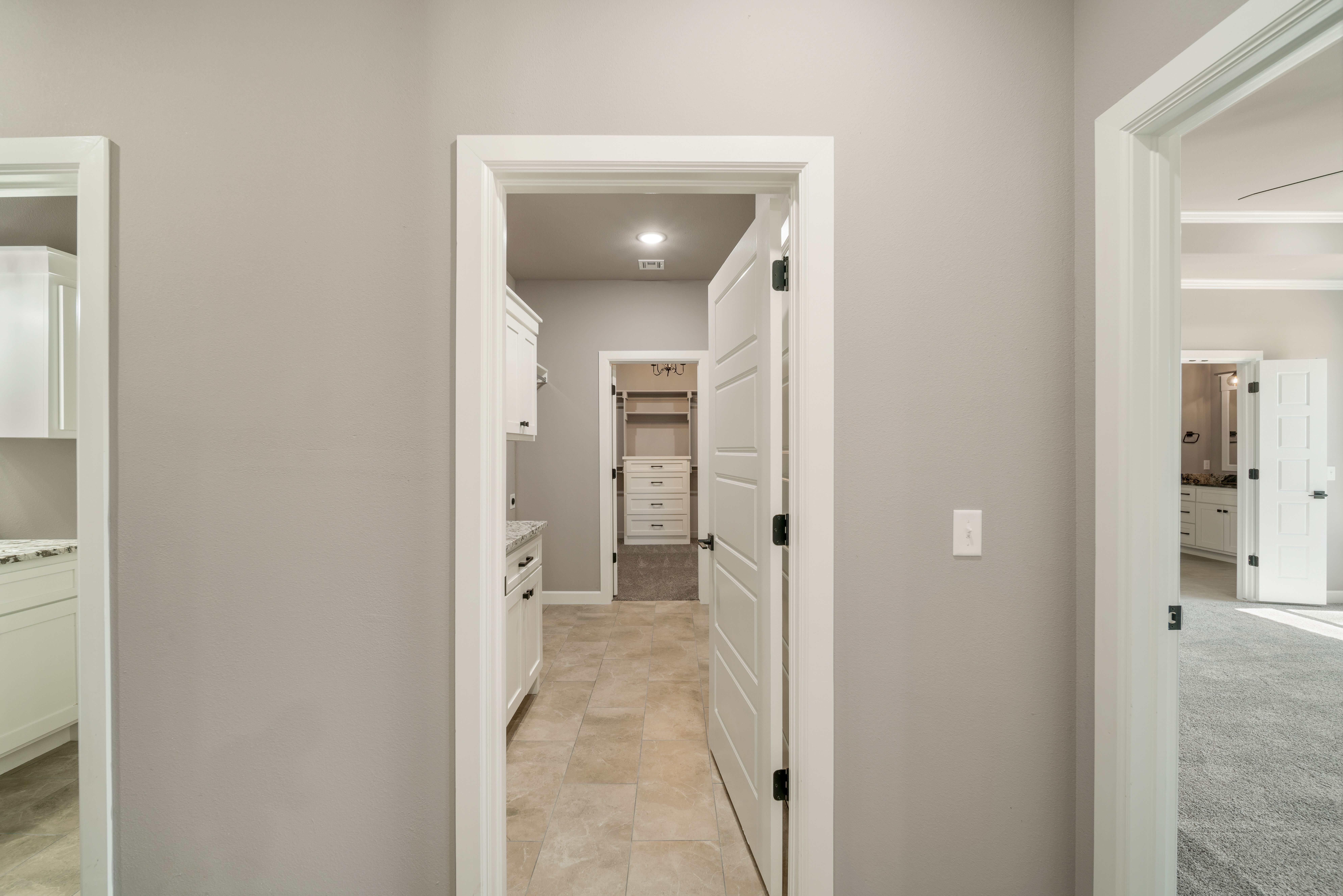 Contemporary floor plan featuring a gourmet kitchen, large living areas, and custom details by Mahogany Homes Tulsa.