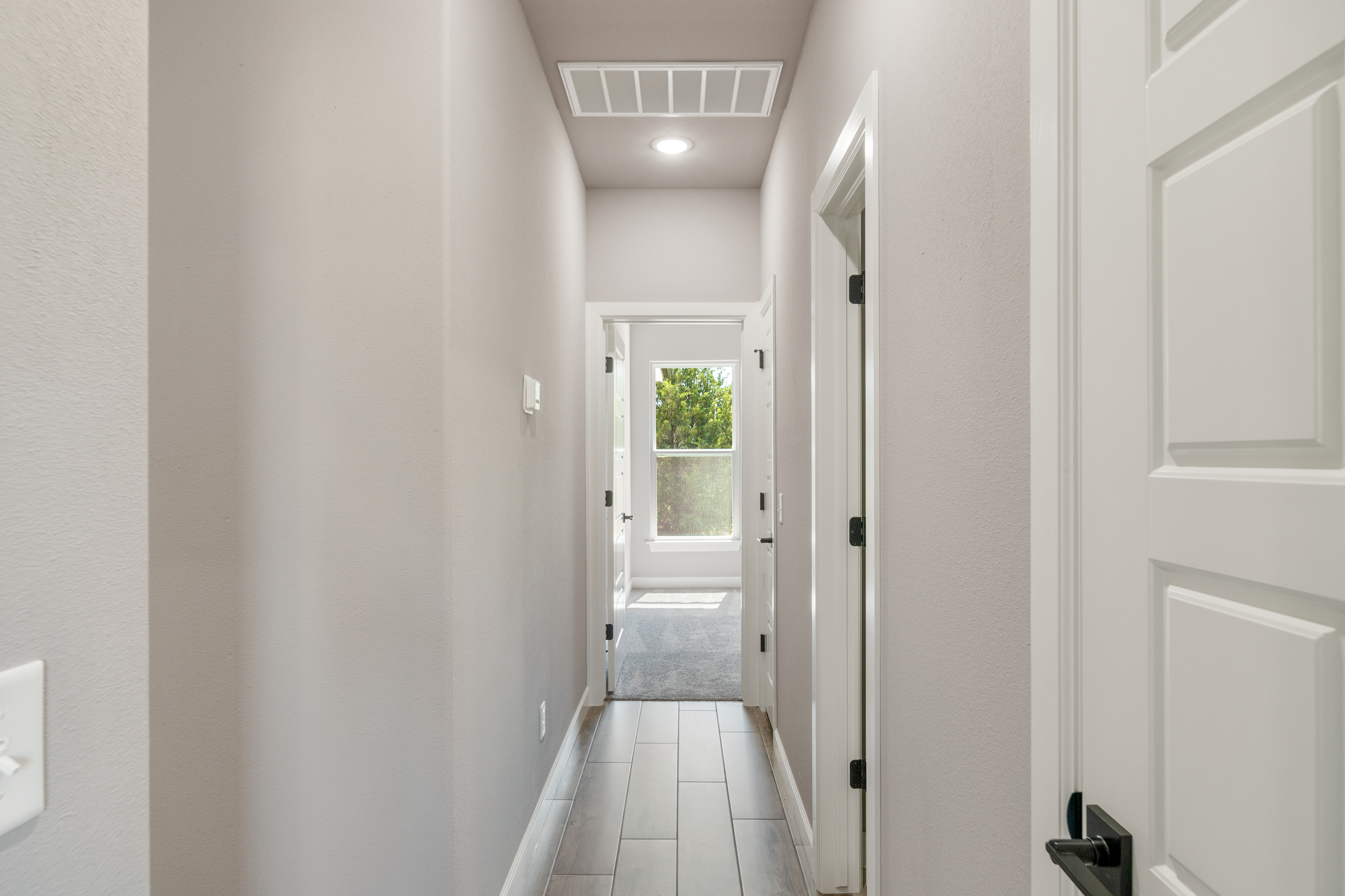 Detailed floor plan featuring a flexible design with large bedrooms and ample closet space by Mahogany Homes Tulsa.