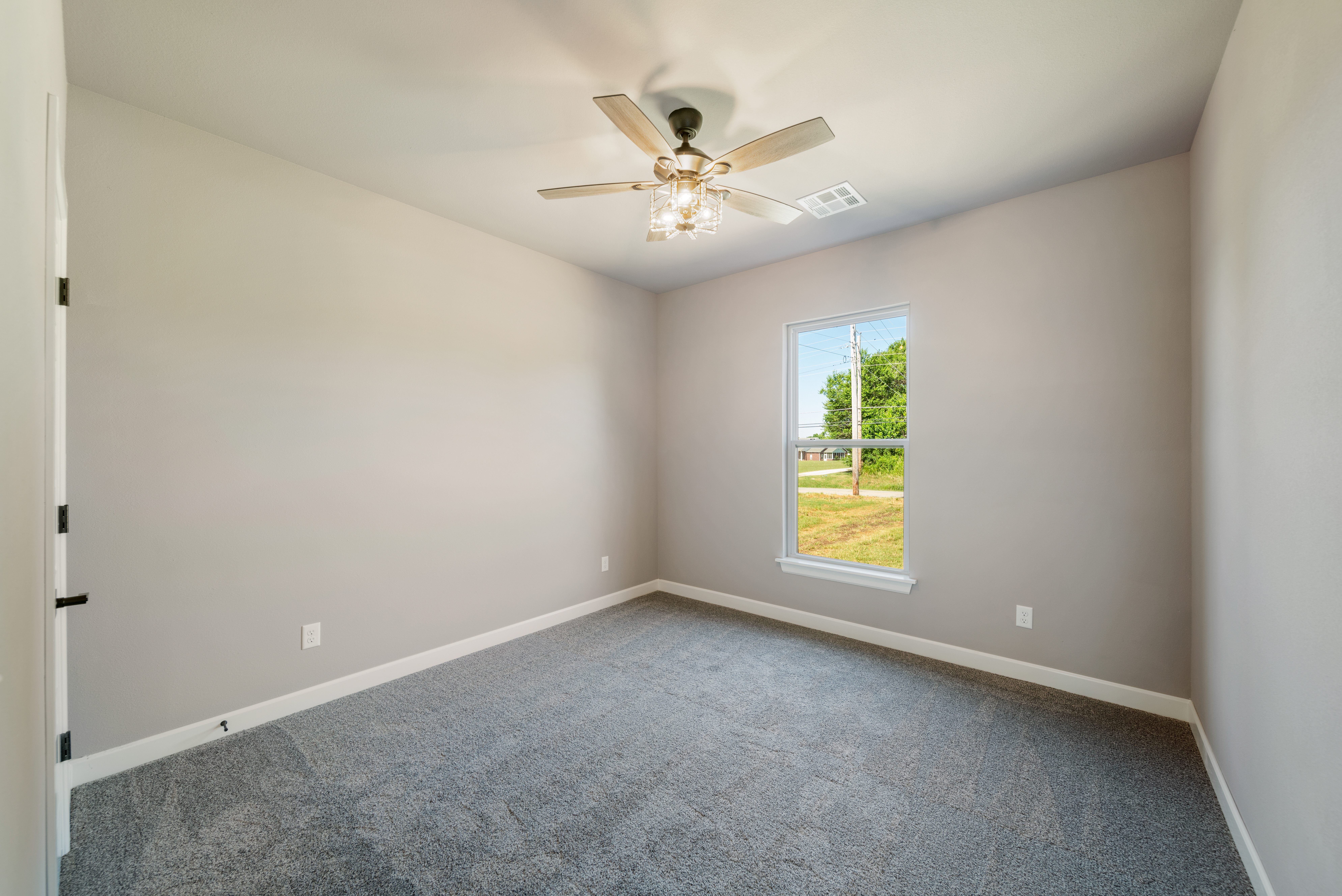 Open-concept floor plan with luxury features and unique design by Mahogany Homes Tulsa.