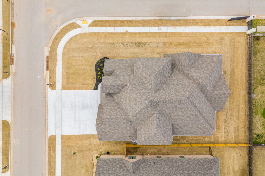 Newly constructed home with a stylish exterior by Mahogany Homes.