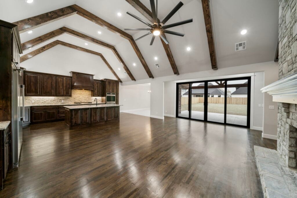 Bright and airy living room with sophisticated design elements by Mahogany Homes Tulsa.