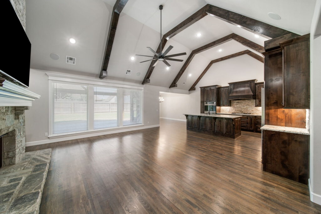 Bright and welcoming living room featuring sleek design and high-end details by Mahogany Homes Tulsa.