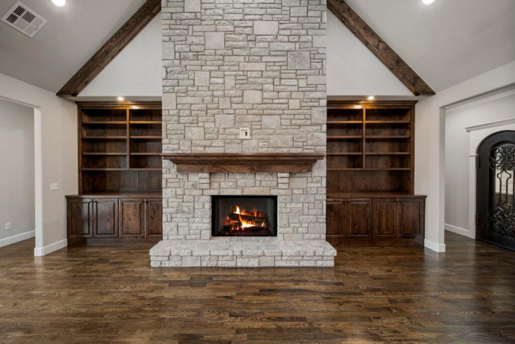 Luxurious living room with a contemporary feel and top-quality materials by Mahogany Homes Tulsa