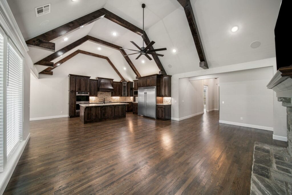 Elegant living room with designer touches and custom finishes by Mahogany Homes.