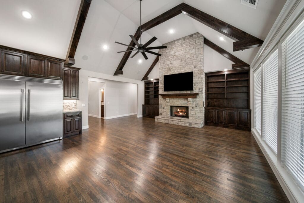 Spacious, inviting living room with ample seating and stylish decor by Mahogany Homes Tulsa.