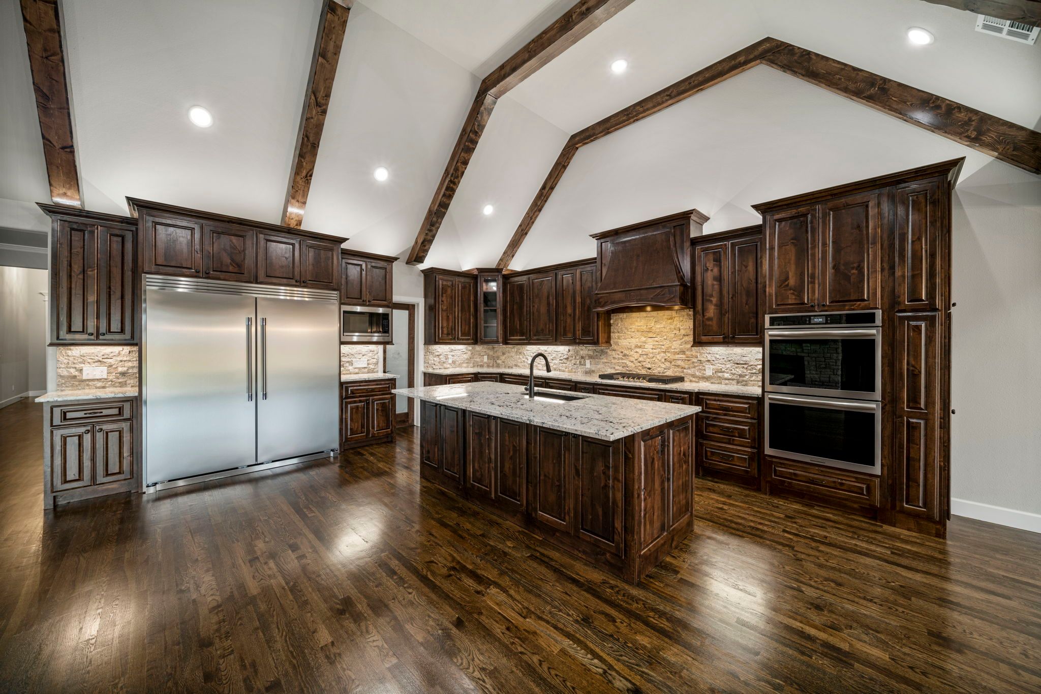 Elegant gourmet kitchen with high-end appliances by Mahogany Homes Tulsa.