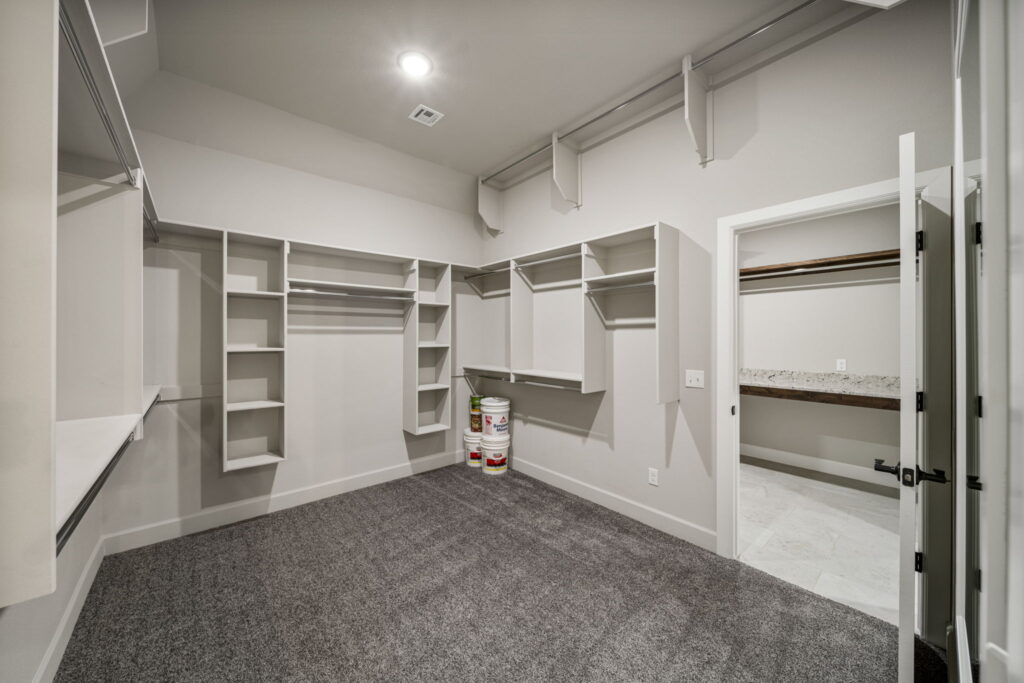 Contemporary floor plan with flexible room usage by Mahogany Homes Tulsa.