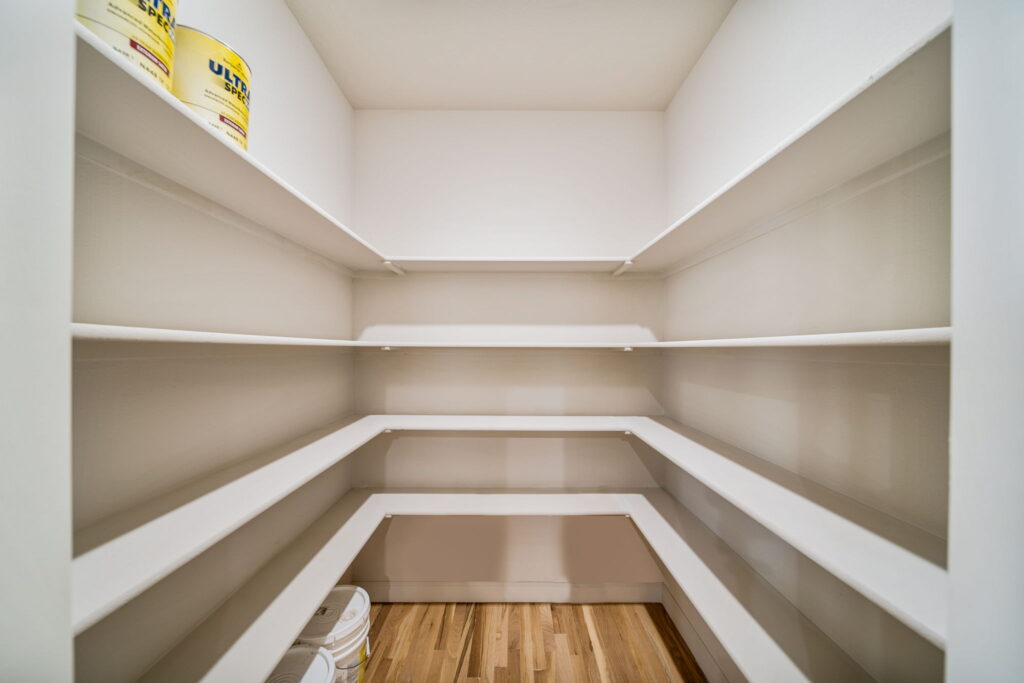 Contemporary home floor plan with a blend of open spaces and cozy private areas by Mahogany Homes Tulsa