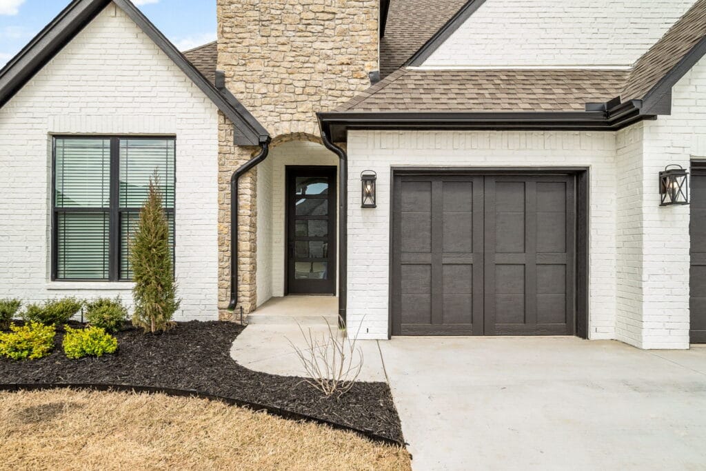 Spacious custom home featuring a beautiful exterior by Mahogany Homes.