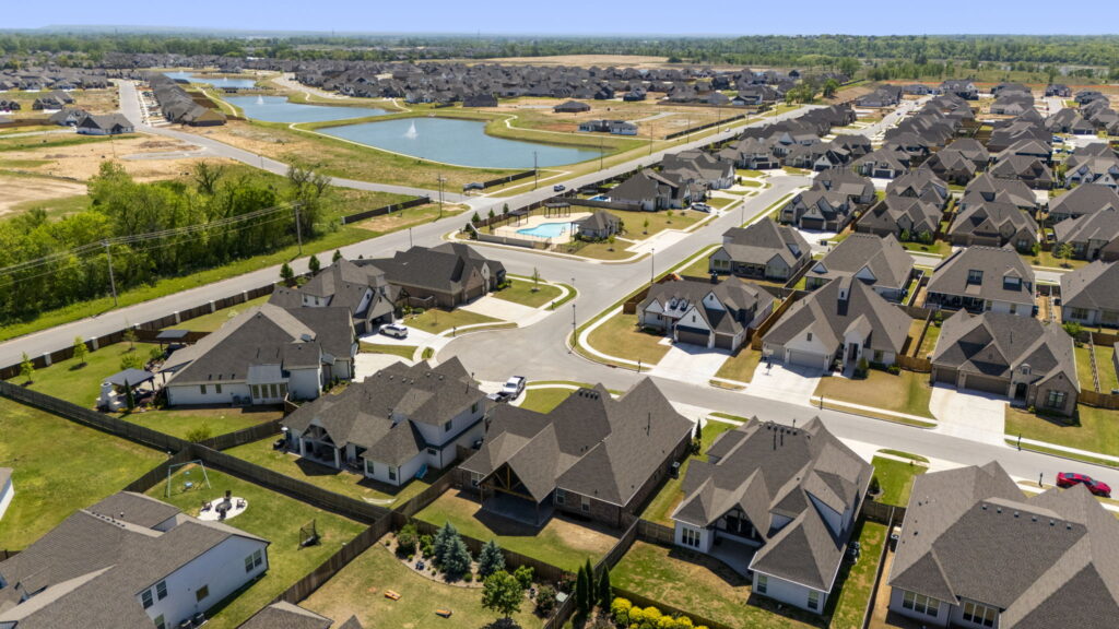 Minimalist modern home exterior with clean lines by Mahogany Homes.