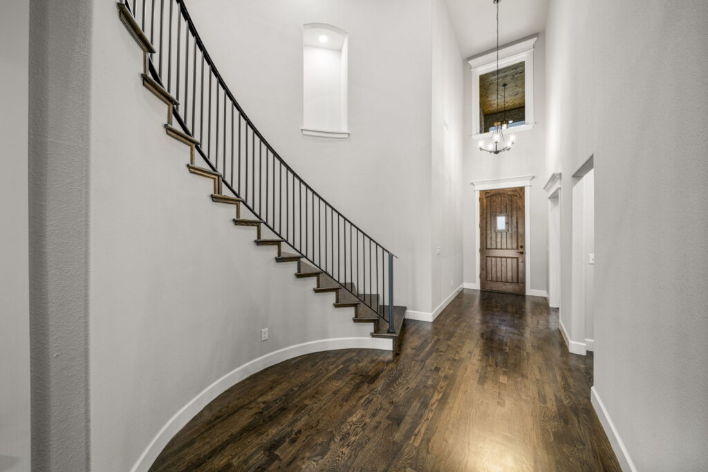 Contemporary floor plan with flexible room usage and a focus on modern living by Mahogany Homes.