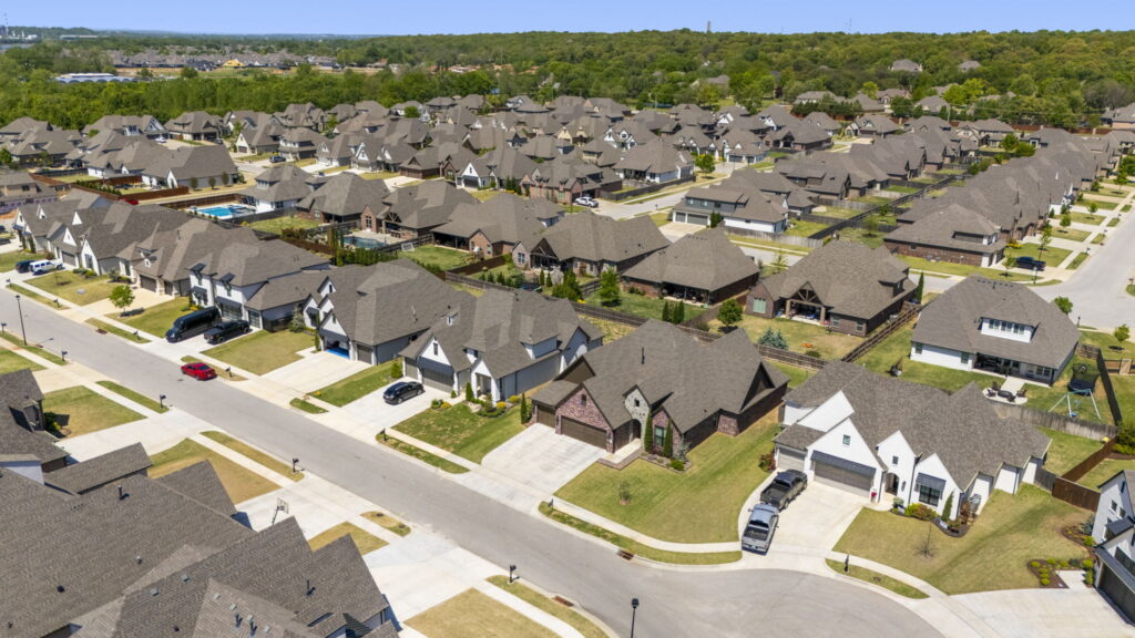 Gorgeous exterior design of a custom-built home in Tulsa by Mahogany Homes.