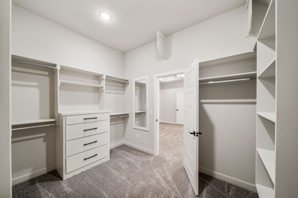 Contemporary floor plan featuring a spacious great room and innovative room arrangements by Mahogany Homes Tulsa