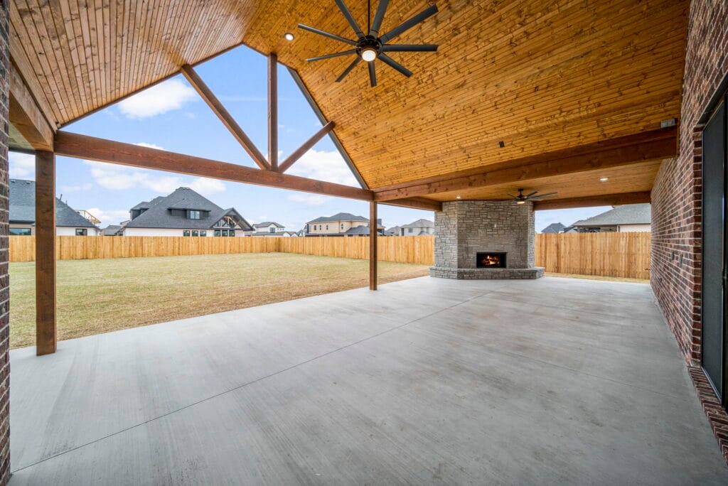 Inviting and well-designed home exterior with a luxurious appeal by Mahogany Homes Tulsa.