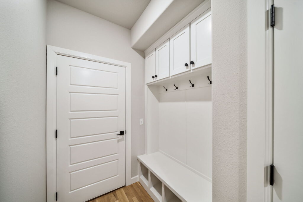 Sleek floor plan with an open-concept layout and contemporary design touches by Mahogany Homes Tulsa.