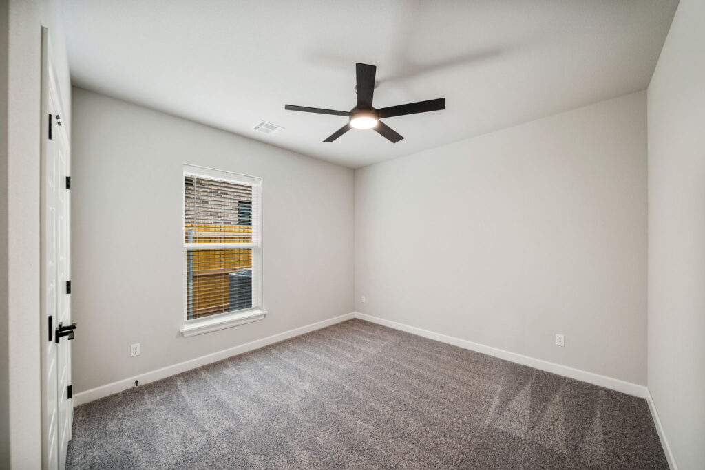 Unique floor plan offering a luxurious master suite, office area, and large kitchen by Mahogany Homes