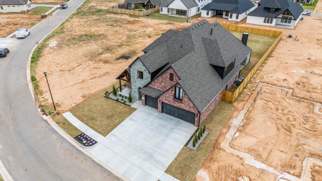 Sleek and stylish exterior design of a custom-built home in Tulsa by Mahogany Homes