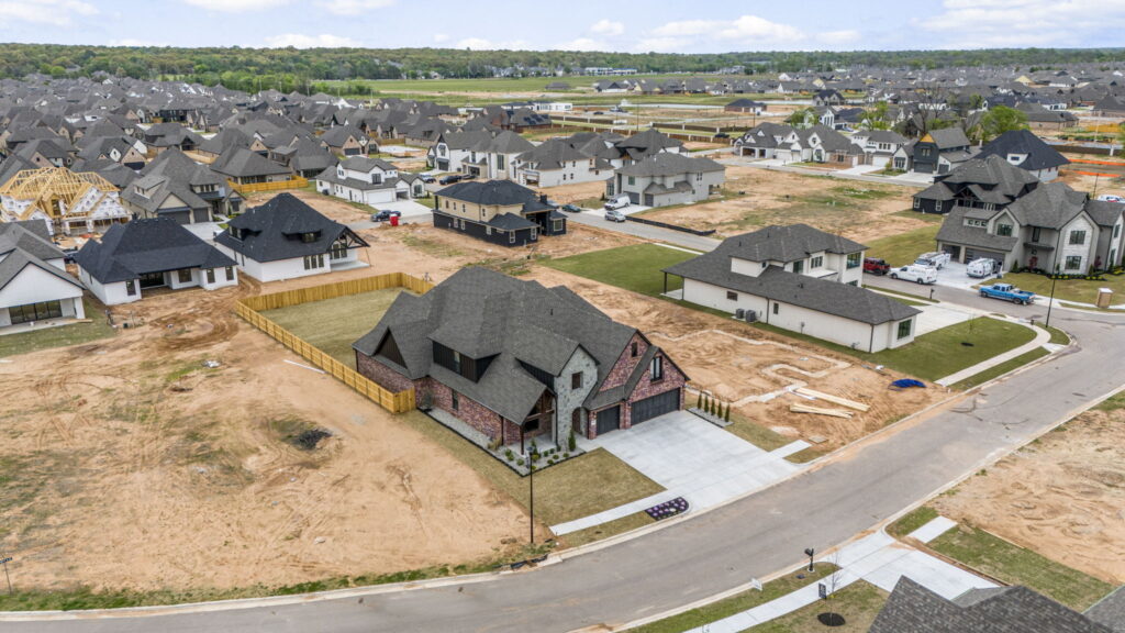 Spacious home exterior featuring contemporary design elements by Mahogany Homes Tulsa.