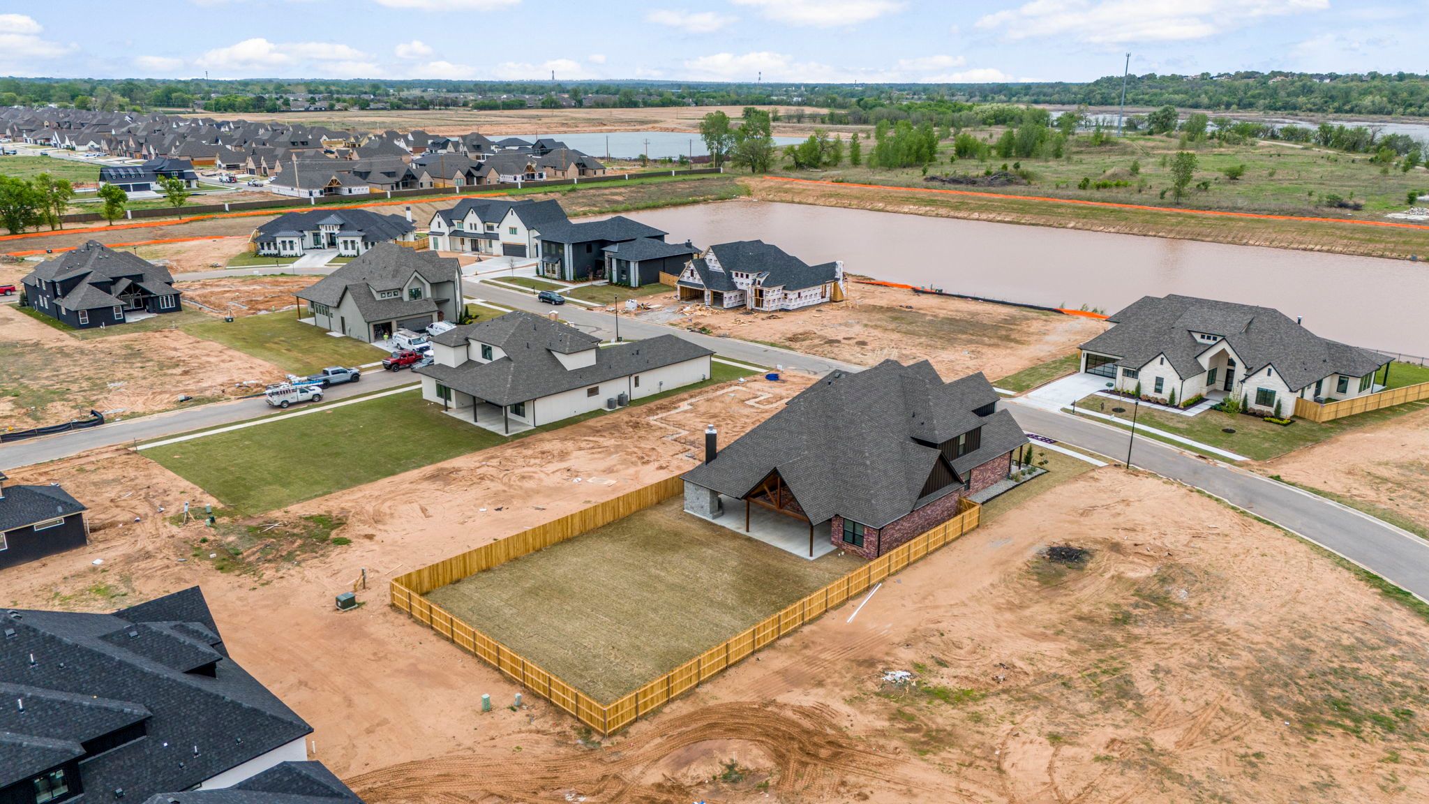 Exquisite exterior design of a custom home, combining elegance and modern style by Mahogany Homes Tulsa.