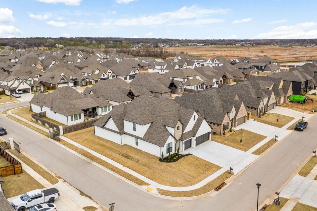 Custom-built home exterior with a modern touch by Mahogany Homes Tulsa.